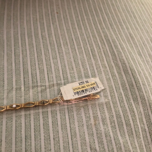 This Silver Gold plated Bracelet with diamond and sapphire accents is Beautiful. - Picture 6 of 12